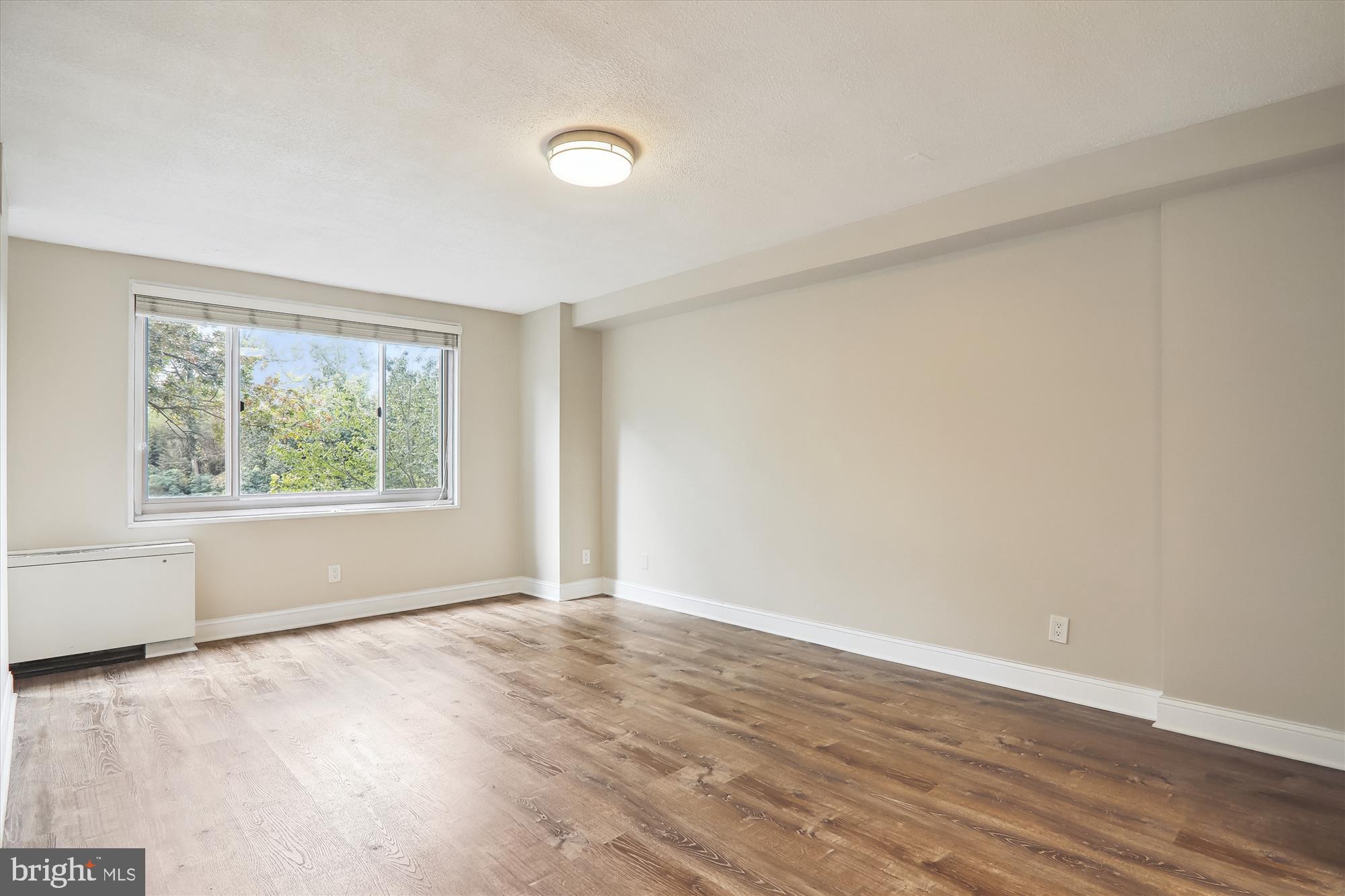 1900 Lyttonsville Road, Unit 310 Silver Spring, MD 20910 - Photo 8 of 48 Living Room
