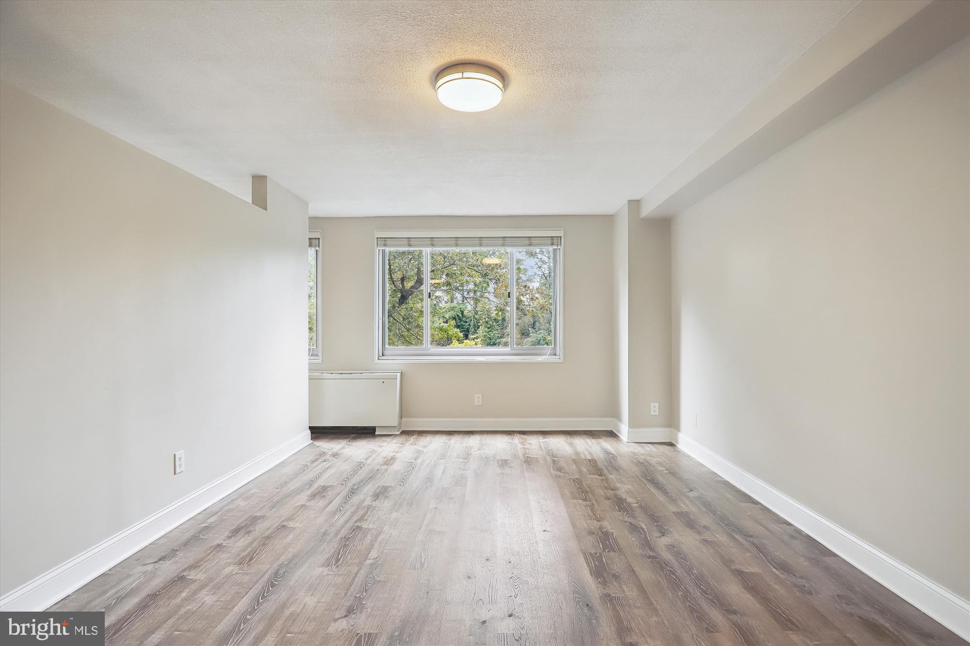 1900 Lyttonsville Road, Unit 310 Silver Spring, MD 20910 - Photo 9 of 48 Living Room