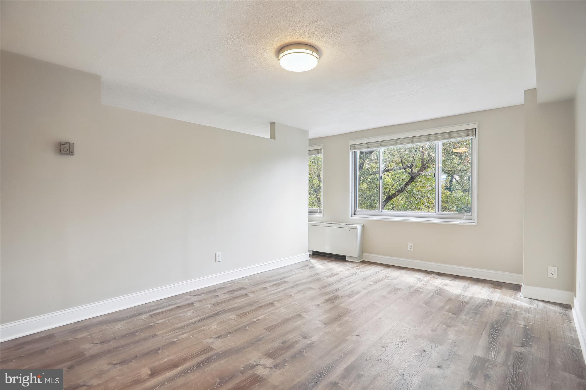 1900 Lyttonsville Road, Unit 310 Silver Spring, MD 20910 - Photo 10 of 48 Living Room