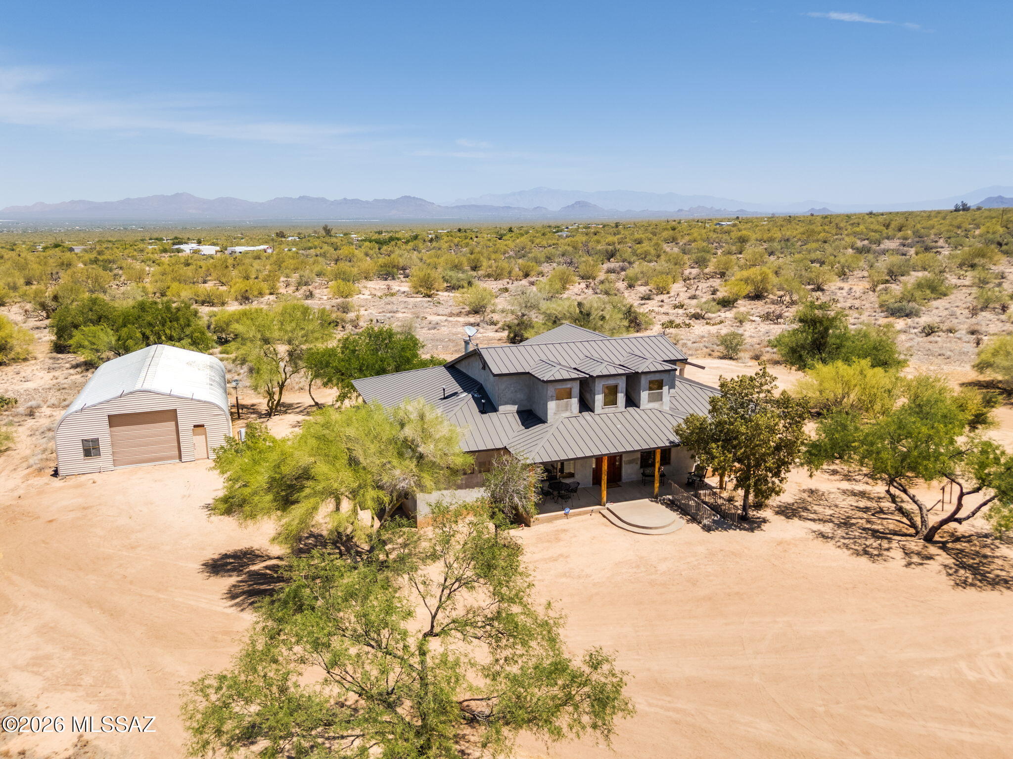 12810 West Gunsmoke Road Tucson, AZ 85736 - Photo 47 of 51 an aerial view of residential houses with outdoor space