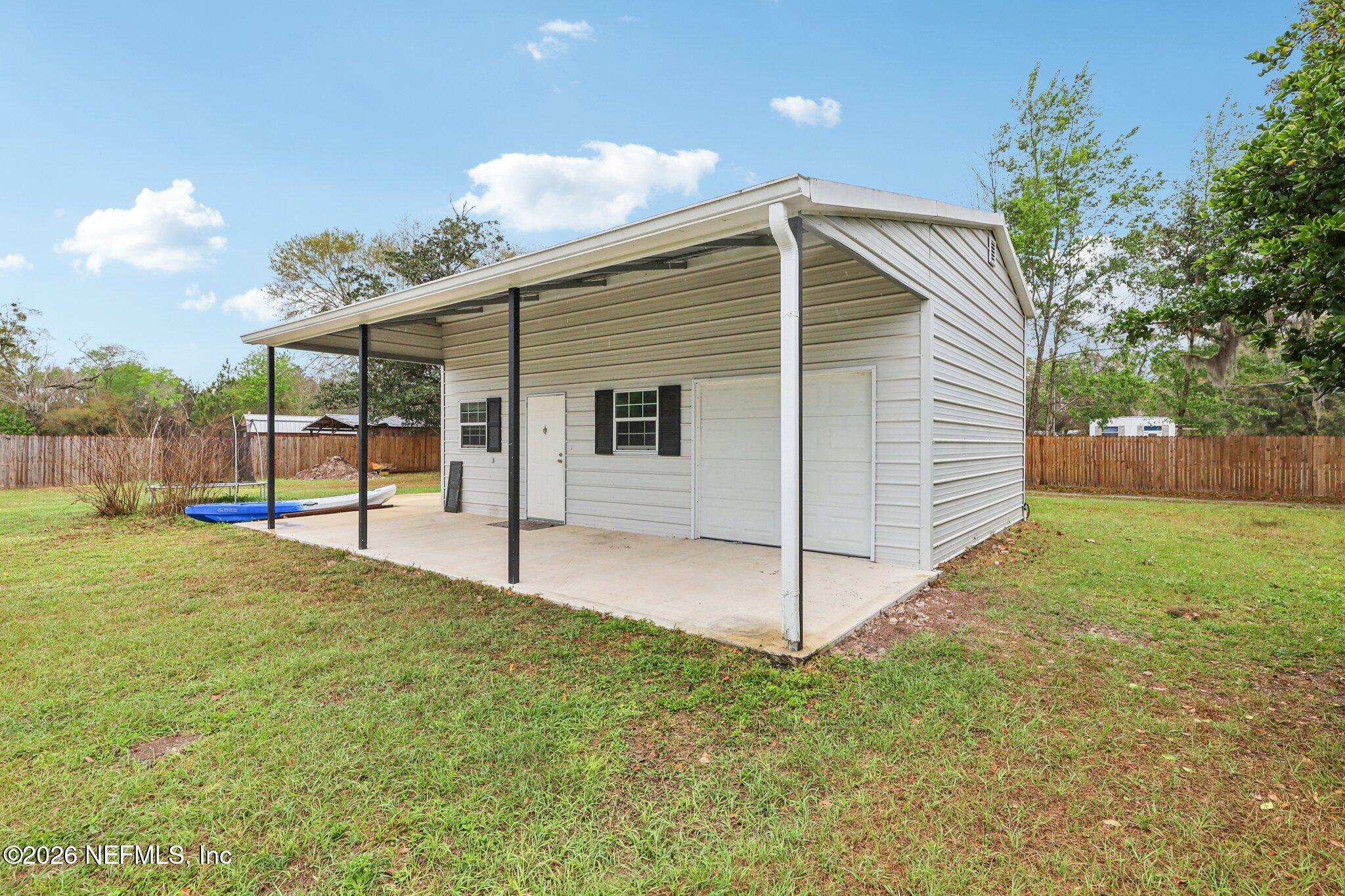 3606 Thunder Road Green Cove Springs, FL 32043 - Photo 33 of 58 Patio on Detached Garage/Workshop