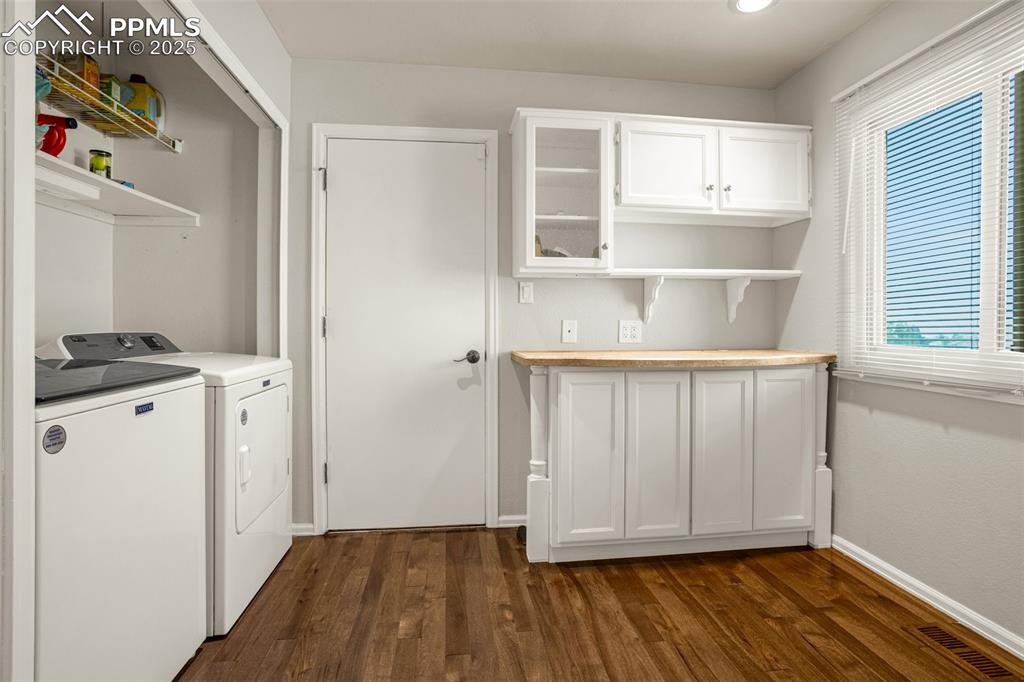 342 Mission Hill Way Colorado Springs, CO 80921 - Photo 14 of 37 a view of kitchen with wooden floor and electronic appliances