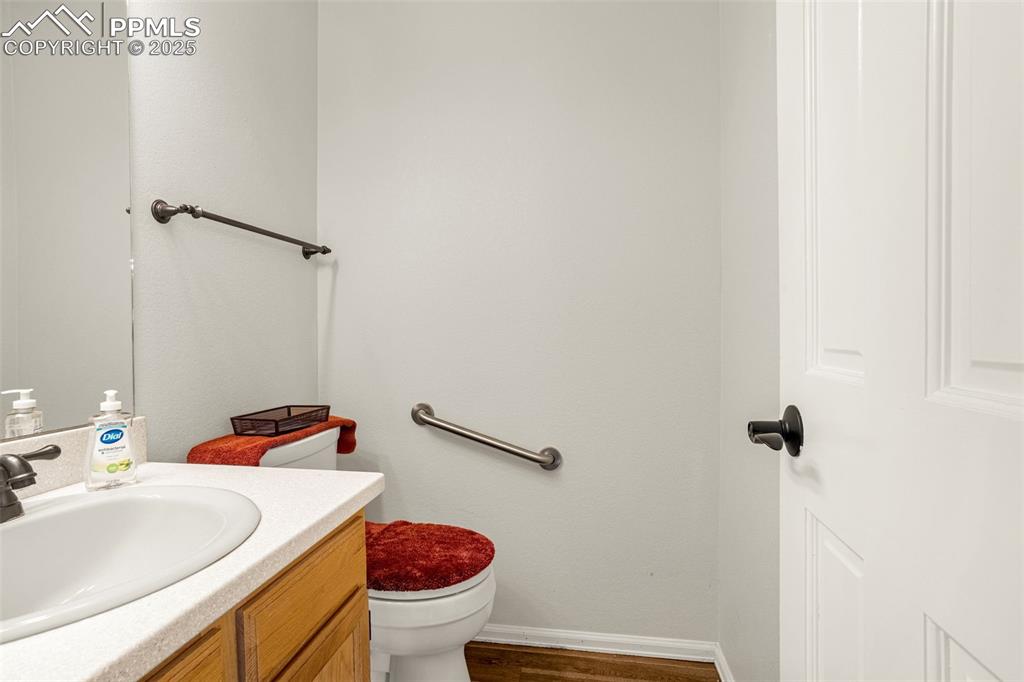 342 Mission Hill Way Colorado Springs, CO 80921 - Photo 20 of 37 a bathroom with a sink and a toilet