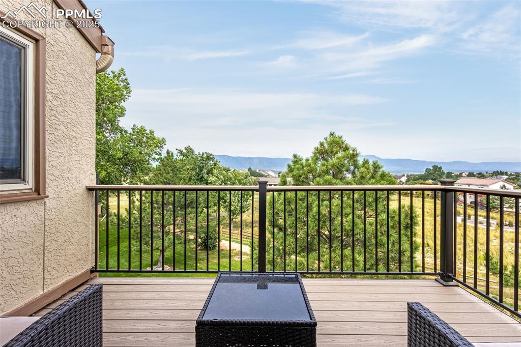 342 Mission Hill Way Colorado Springs, CO 80921 - Photo 3 of 37 a balcony with view of lake