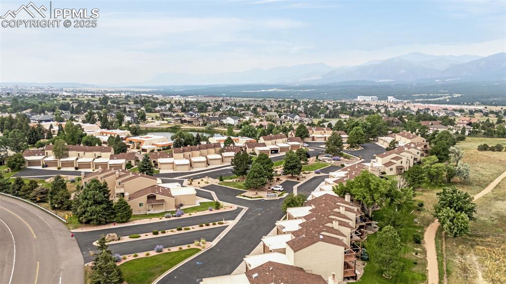 342 Mission Hill Way Colorado Springs, CO 80921 - Photo 34 of 37 an aerial view of residential building with parking space