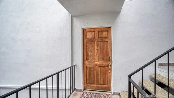 a view of entryway with stairs