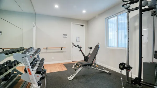 a view of a room with gym equipment