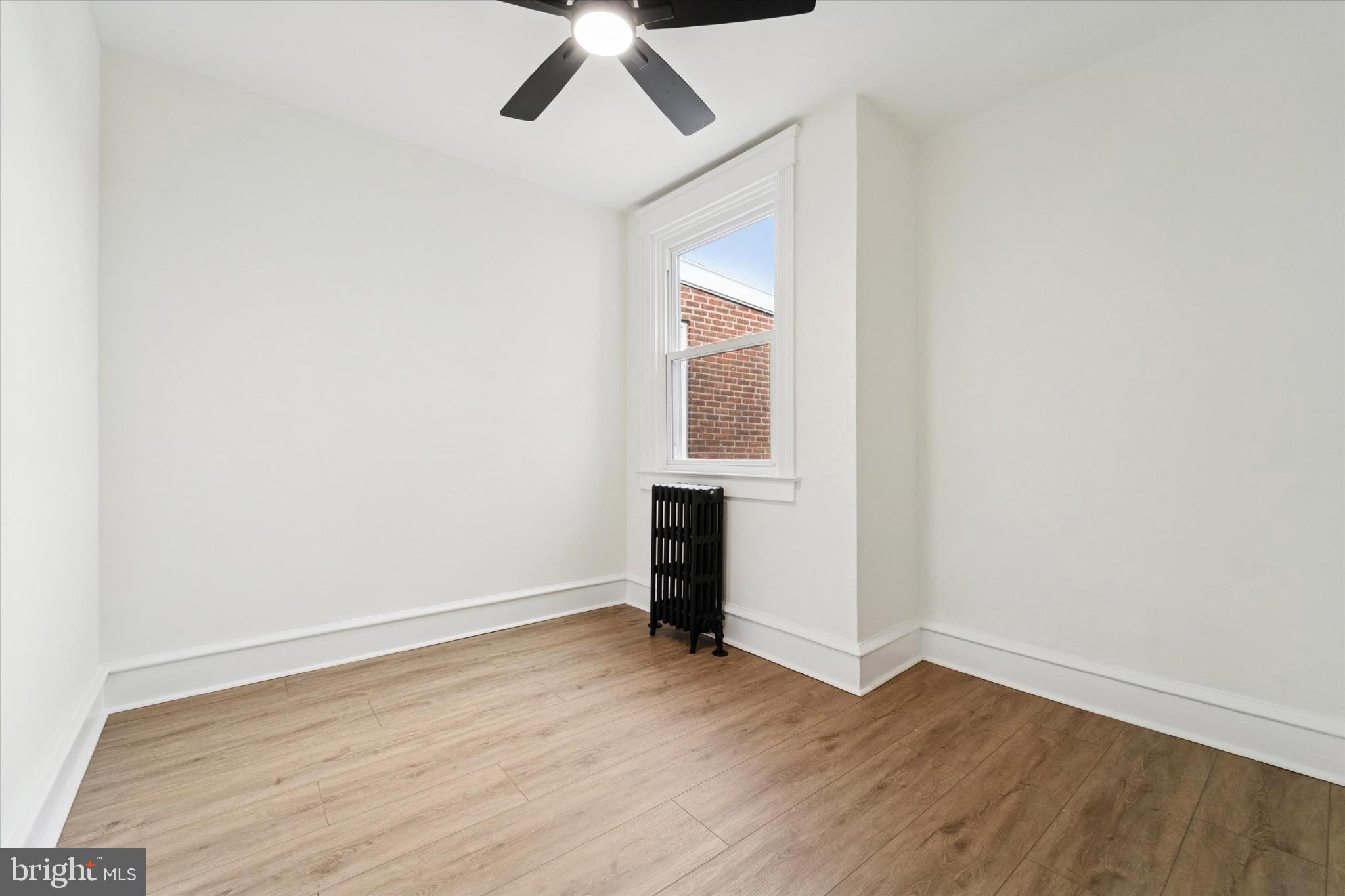 247 Coverly Road Lansdowne, PA 19050 - Photo 5 of 25 an empty room with wooden floor table and closet