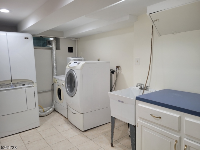 20 Miele Place Summit, NJ 07901 - Photo 16 of 23 a utility room with dryer and washer