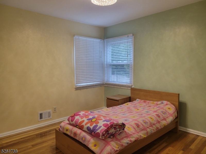 20 Miele Place Summit, NJ 07901 - Photo 10 of 23 a bedroom with a bed and a window