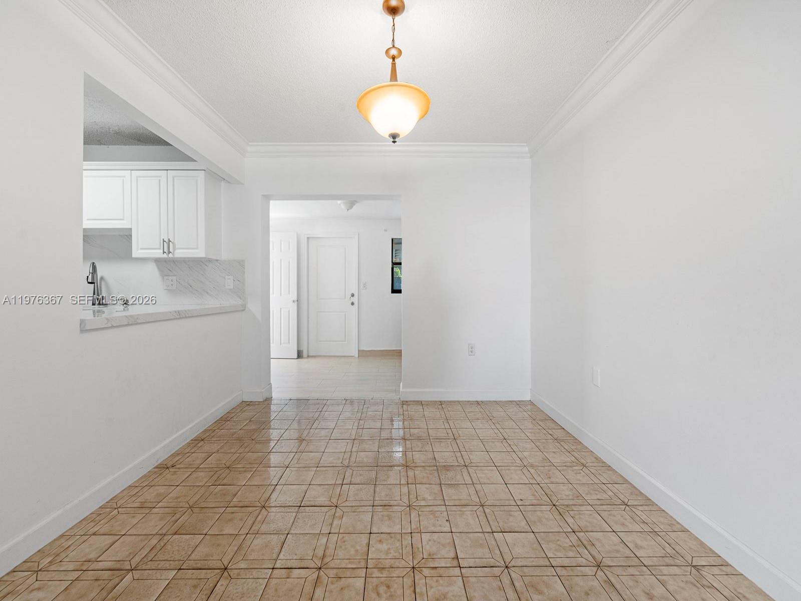 7121 Southwest 102nd Court Miami, FL 33173 - Photo 6 of 33 a view of a kitchen with a sink