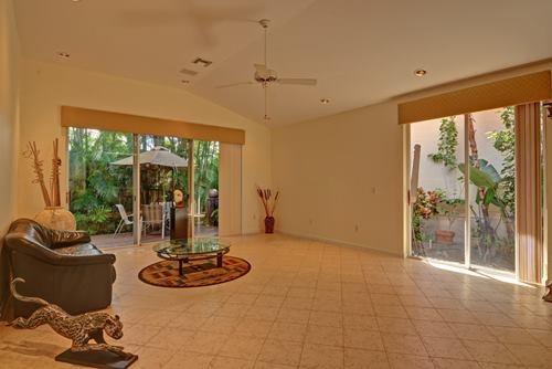 5156 Northwest 26th Circle Boca Raton, FL 33496 - Photo 5 of 18 a view of a livingroom with furniture and window