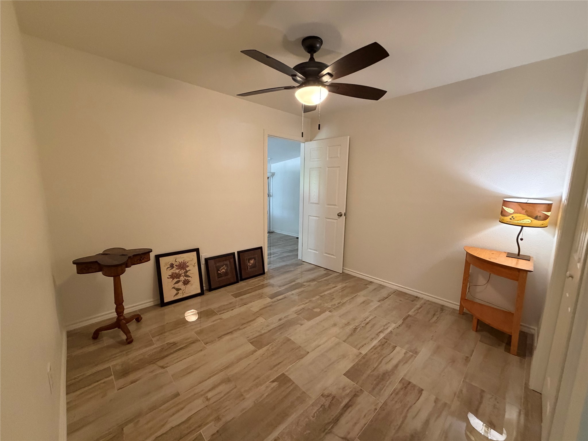 301 Sheraton Avenue Austin, TX 78745 - Photo 8 of 27 Bedroom two is peaceful and cozy with wonderful closet space and it opens to a fully enclosed flex room ~ perfect as a home office, studio or extra living space.