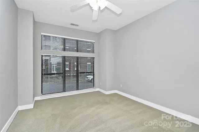 an empty room with a bathroom