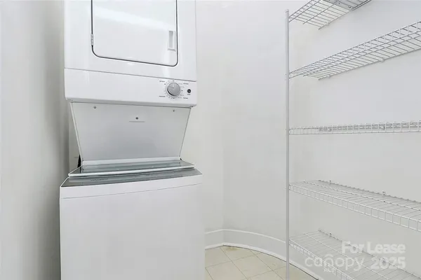 a view of a balcony with a bench