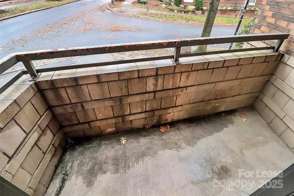 a kitchen with a refrigerator and window