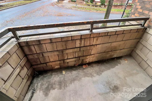 a kitchen with a refrigerator and window