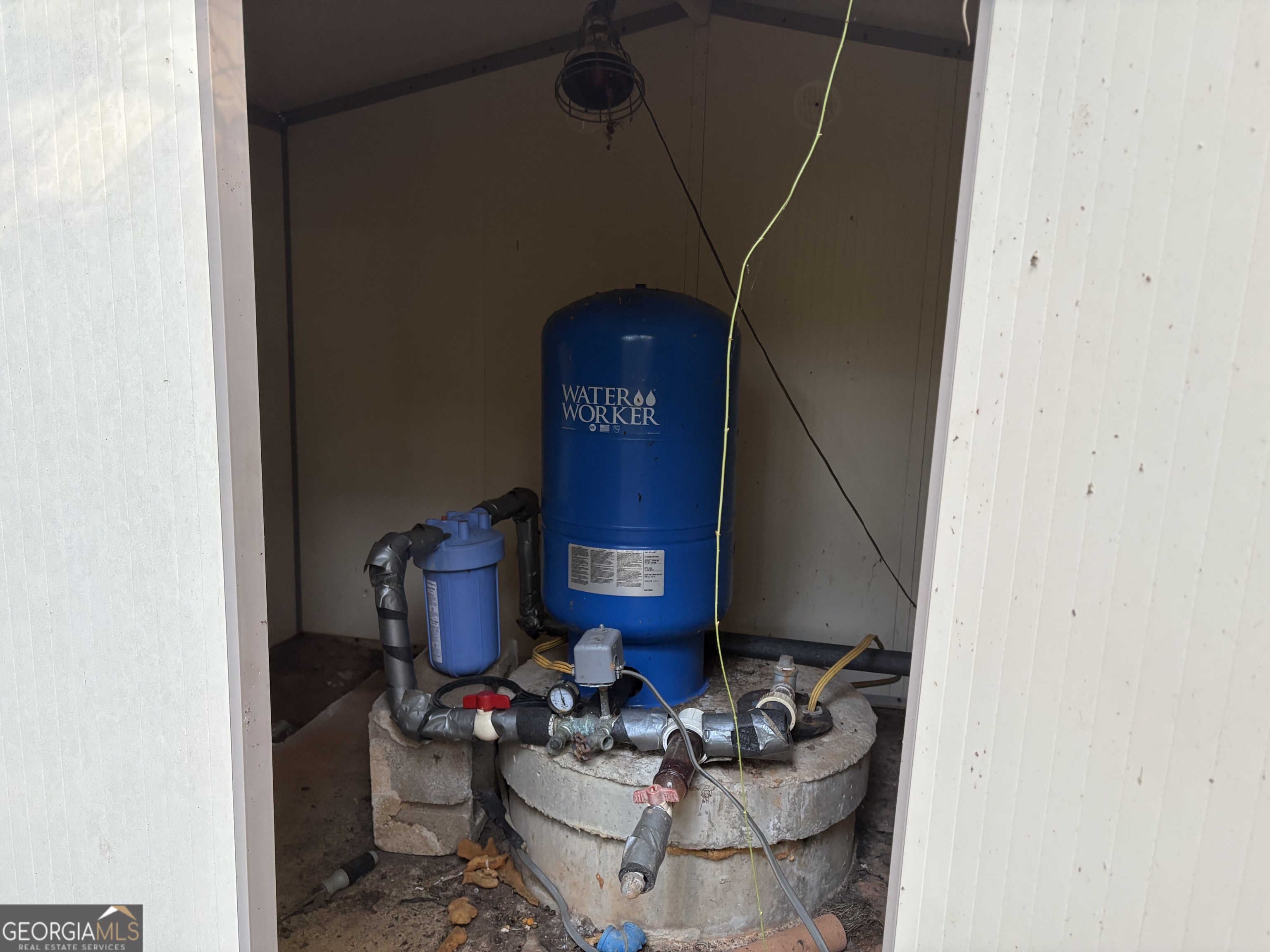 1787 Ramah Church Road Culloden, GA 31016 - Photo 5 of 5 a living room with furniture and a fireplace