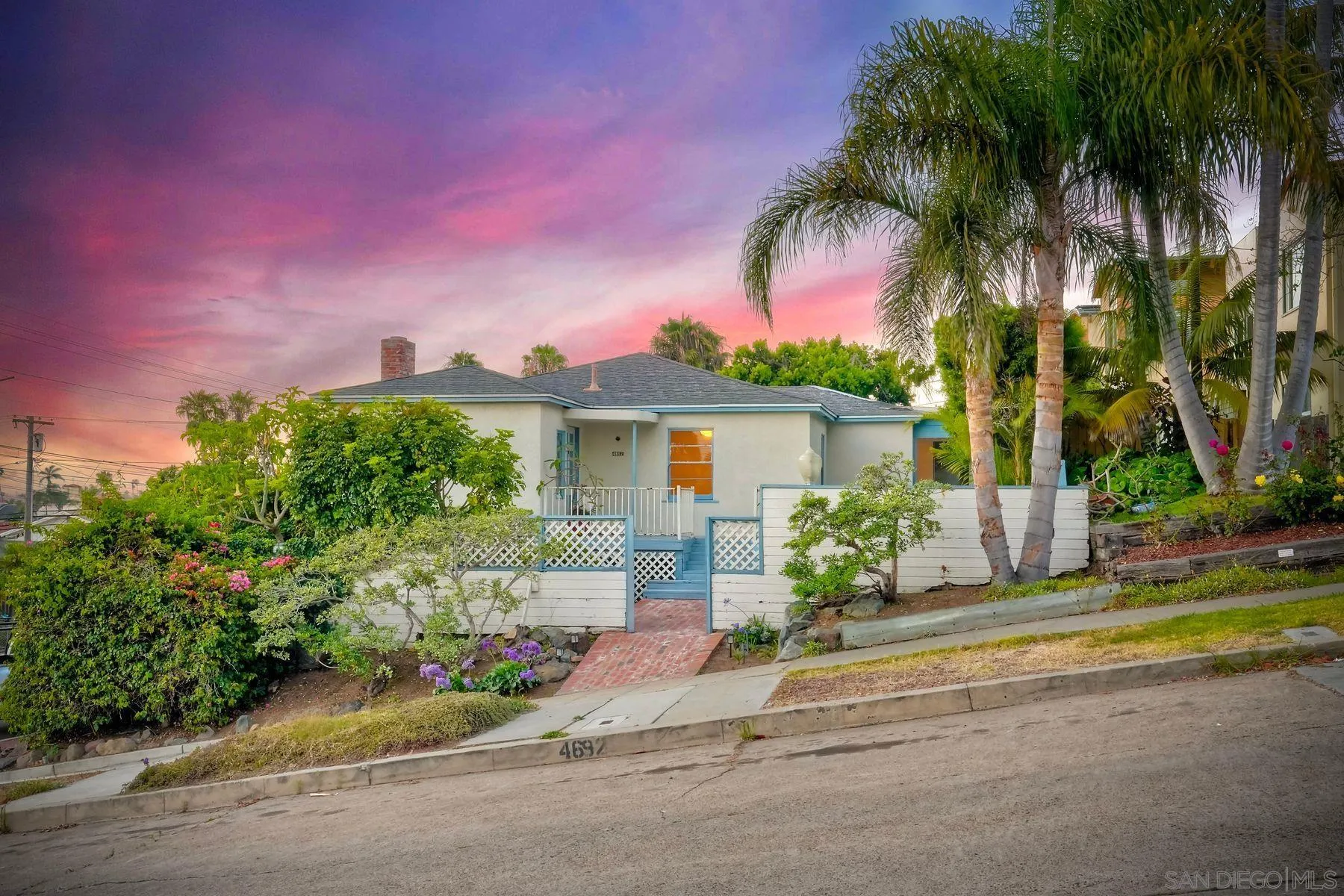 4692 Niagara Avenue San Diego, CA 92107 - Photo 2 of 62 front view of a house with a garden and a house