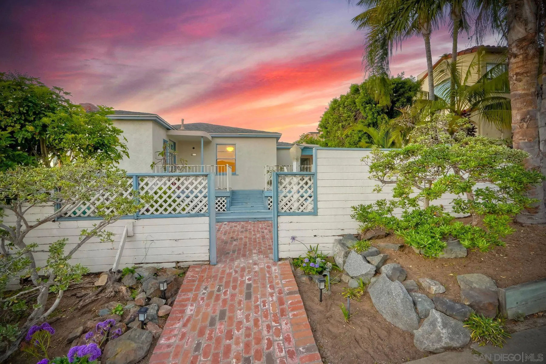 4692 Niagara Avenue San Diego, CA 92107 - Photo 28 of 62 front view of a house with a yard