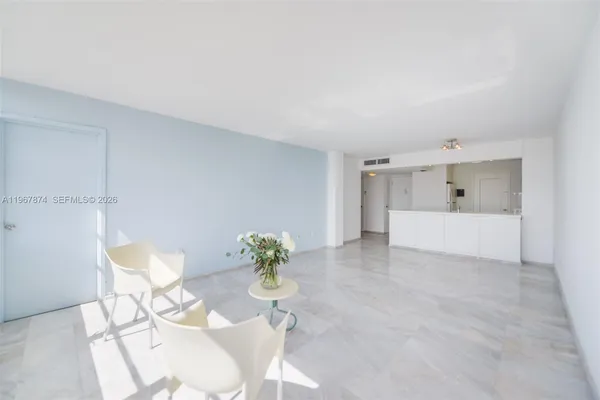 a view of a kitchen with a sink