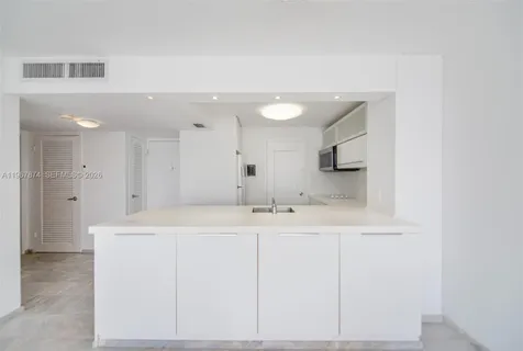 $295,000 | 8000 Harding Avenue, Unit 4B, Miami Beach, FL 33141