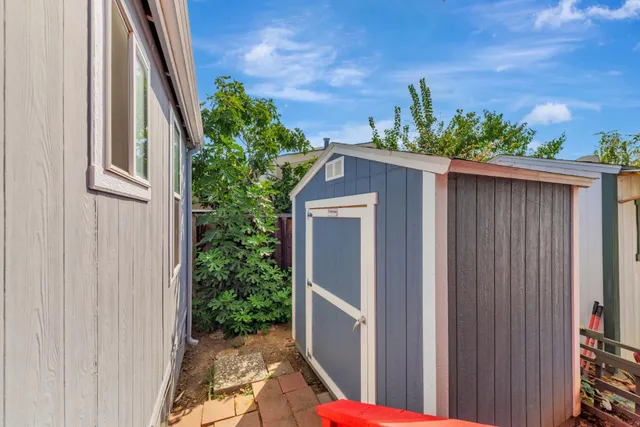 a balcony view with an outdoor seating
