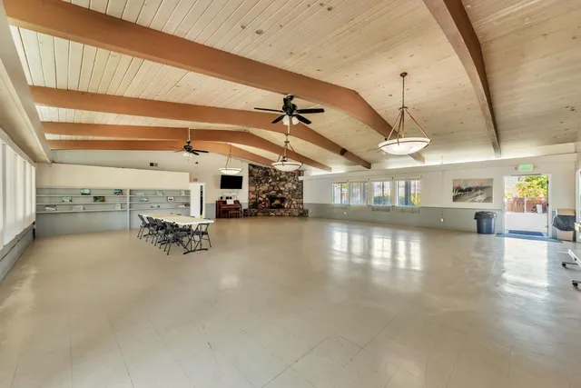 a view of a water heater room with a garage