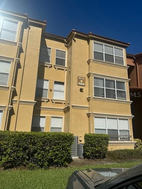 5160 Conroy Road, Unit 32 Orlando, FL 32811 - Photo 3 of 4 a view of a large building