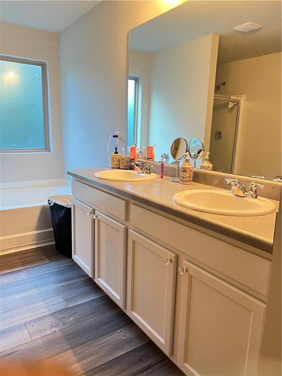 1775 Labonte Parkway McDonough, GA 30253 - Photo 17 of 20 a spacious bathroom with a double vanity sink and a mirror