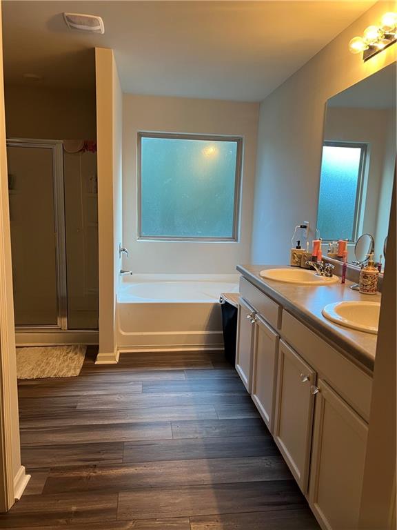 1775 Labonte Parkway McDonough, GA 30253 - Photo 19 of 20 a bathroom with a sink a mirror and a bathtub