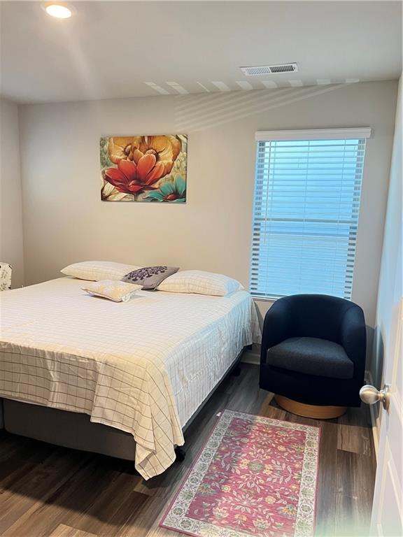 1775 Labonte Parkway McDonough, GA 30253 - Photo 3 of 20 a bedroom with a bed a couch and a window