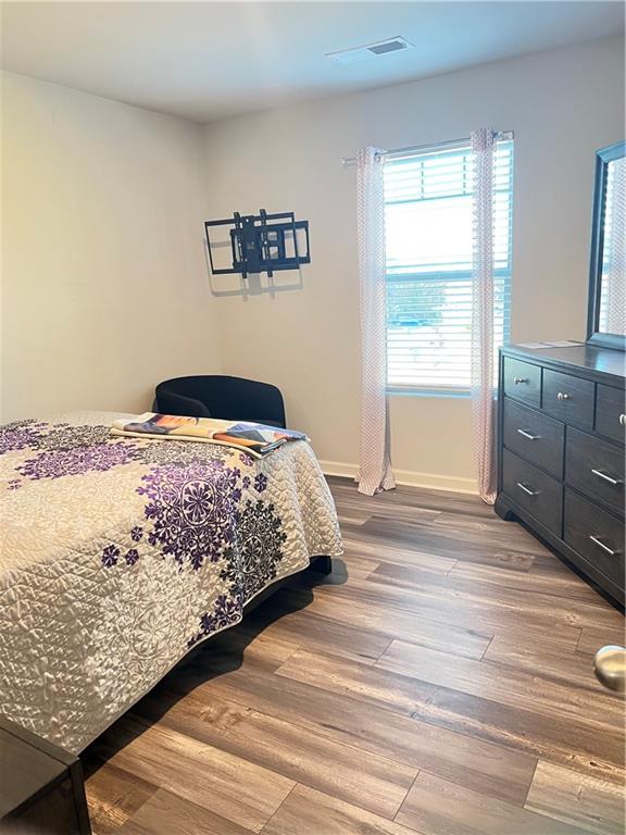 1775 Labonte Parkway McDonough, GA 30253 - Photo 4 of 20 a bedroom with a bed and a window