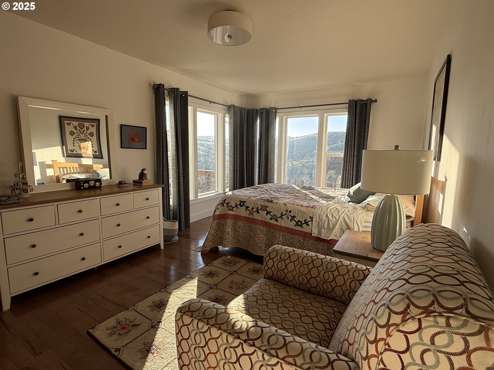 201 4th Street Maupin, OR 97037 - Photo 11 of 24 a bedroom with a bed and a dresser