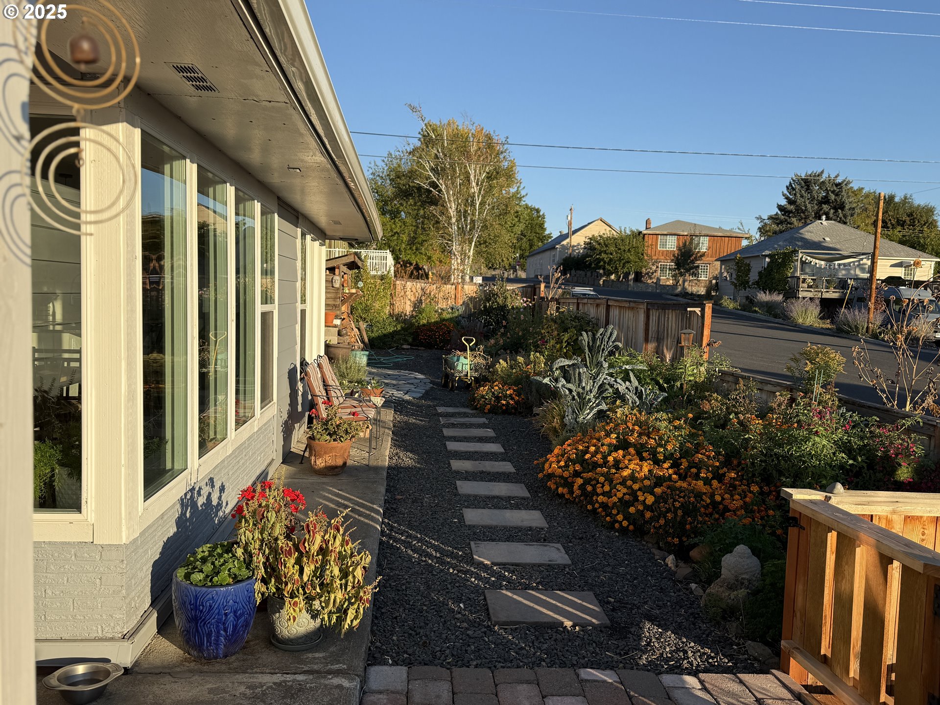 201 4th Street Maupin, OR 97037 - Photo 3 of 24 a front view of a house with garden