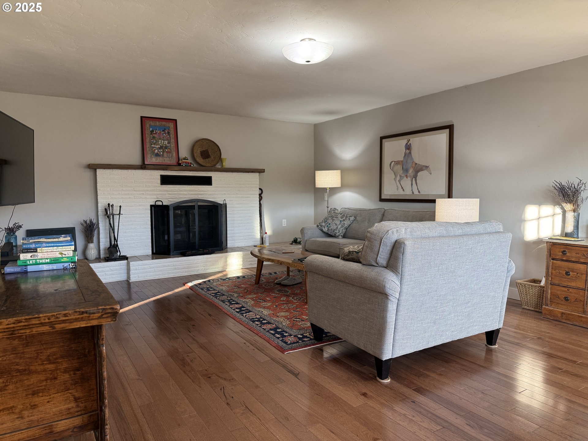 201 4th Street Maupin, OR 97037 - Photo 6 of 24 a living room with furniture and a fireplace