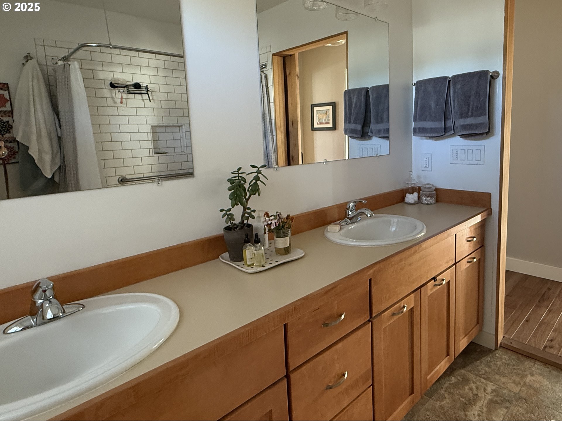 201 4th Street Maupin, OR 97037 - Photo 10 of 24 a bathroom with a sink double vanity and a mirror
