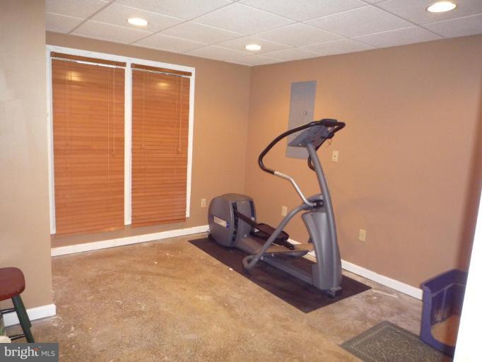 1749 Canal Run Drive Point of Rocks, MD 21777 - Photo 14 of 21 a view of a room with gym equipment