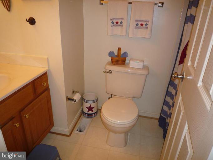 1749 Canal Run Drive Point of Rocks, MD 21777 - Photo 7 of 21 a white toilet sitting next to a sink