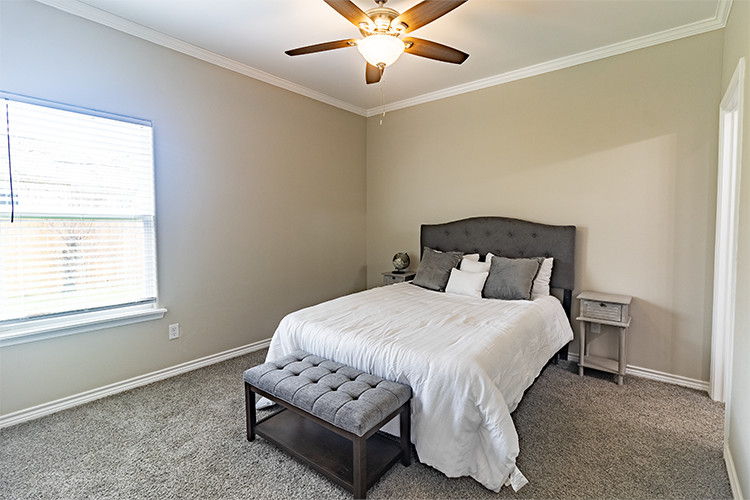 803 Hall Street Bryan, TX 77803 - Photo 8 of 11 a bedroom with a bed and window