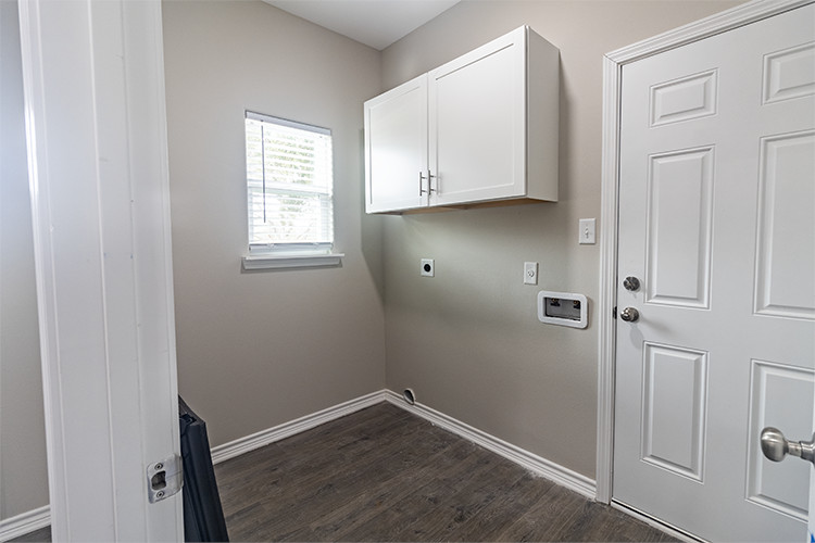 803 Hall Street Bryan, TX 77803 - Photo 10 of 11 an empty room with wooden floor and closet