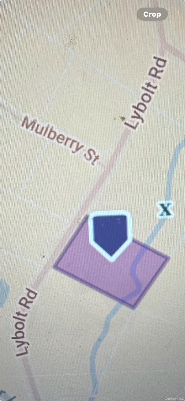 a bedroom with a bed and a rug