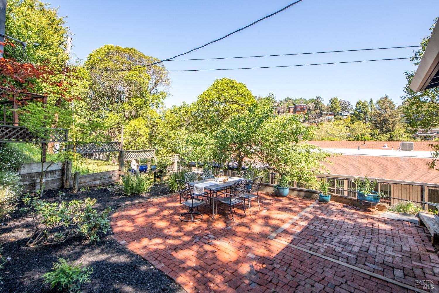 251 West End Avenue San Rafael, CA 94901 - Photo 12 of 35 a view of a patio with table and chairs and potted plants