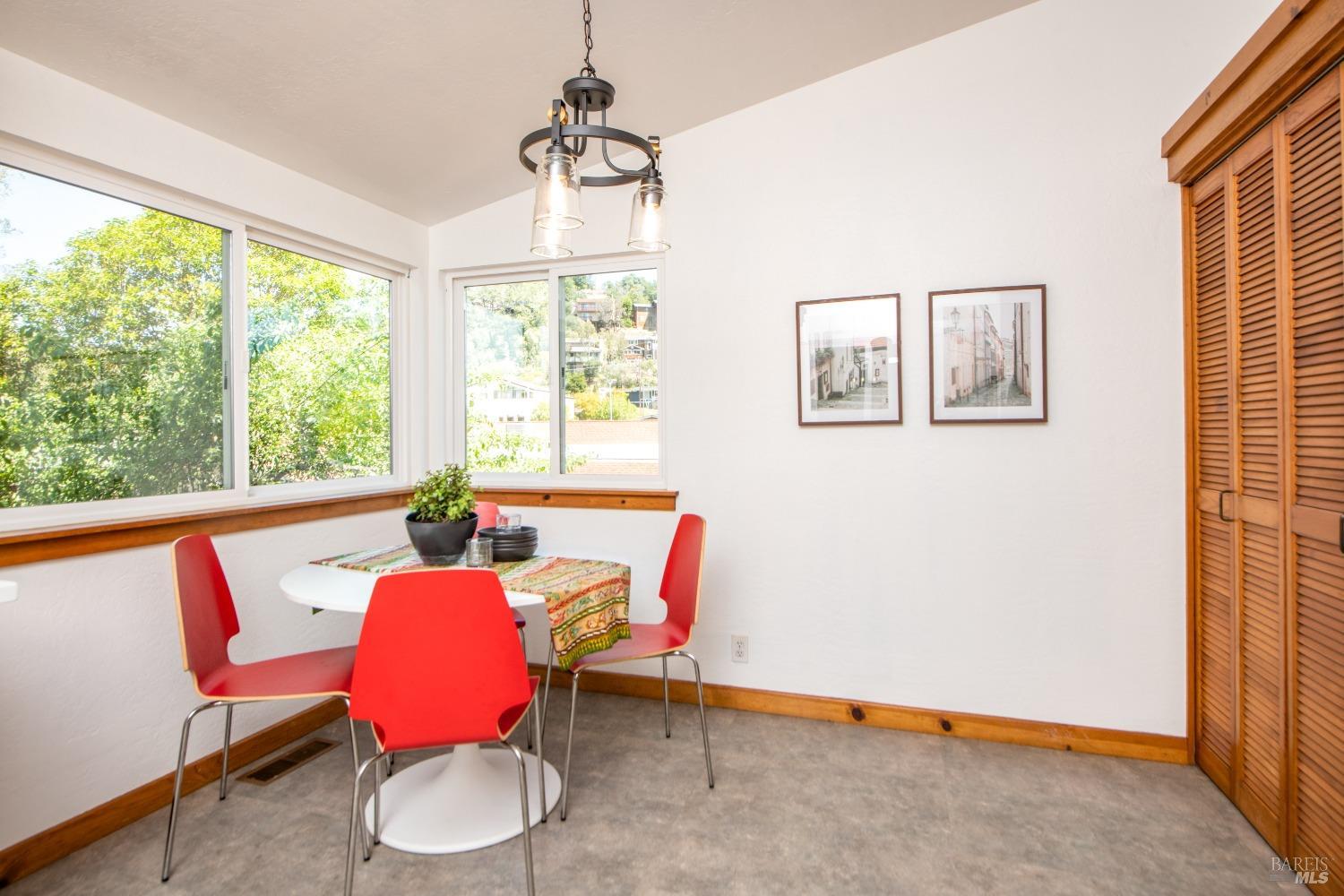 251 West End Avenue San Rafael, CA 94901 - Photo 14 of 35 a view of a dining room with furniture window and wooden floor
