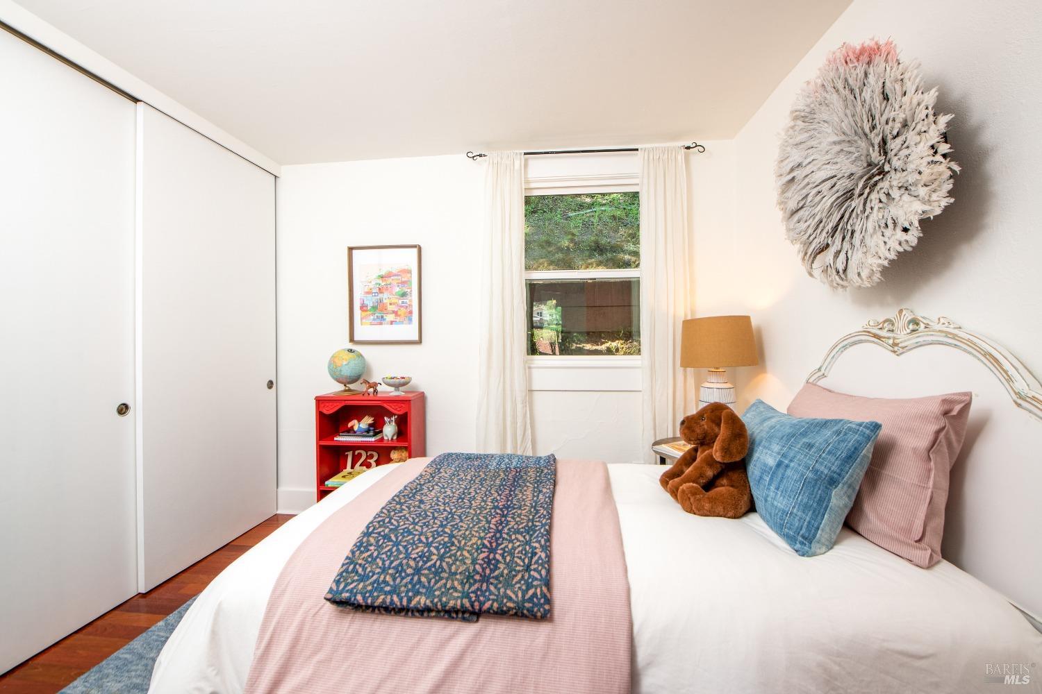 251 West End Avenue San Rafael, CA 94901 - Photo 15 of 35 a bedroom with a bed and a window