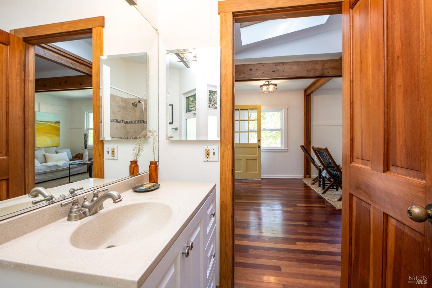251 West End Avenue San Rafael, CA 94901 - Photo 16 of 35 a en suite bathroom with a sink and mirror
