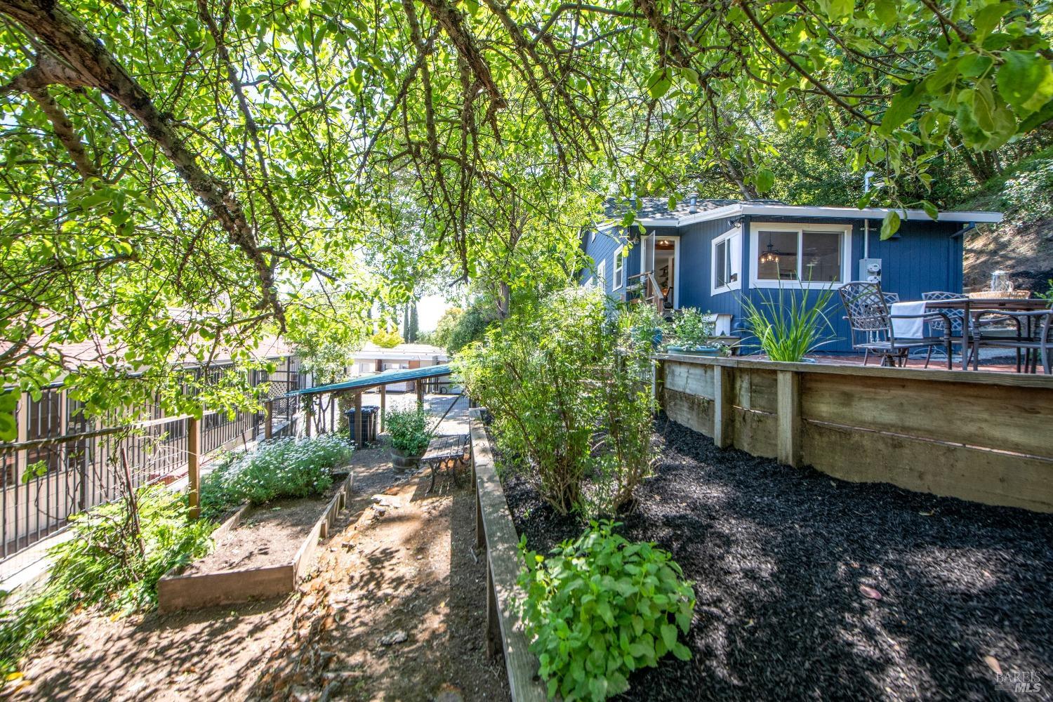 251 West End Avenue San Rafael, CA 94901 - Photo 28 of 35 a view of a house with backyard and sitting area