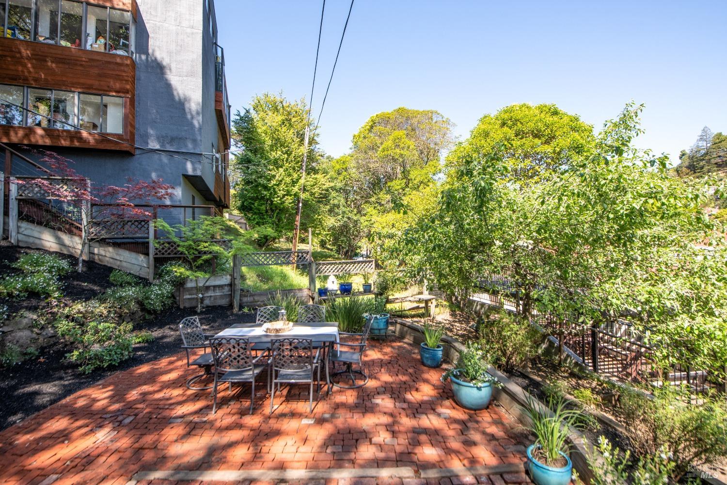 251 West End Avenue San Rafael, CA 94901 - Photo 30 of 35 a view of a chairs and table in a backyard