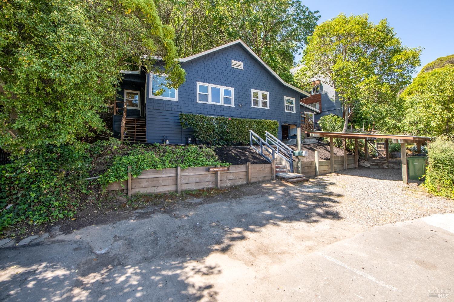 251 West End Avenue San Rafael, CA 94901 - Photo 5 of 35 a brick house that has a tree in front of it