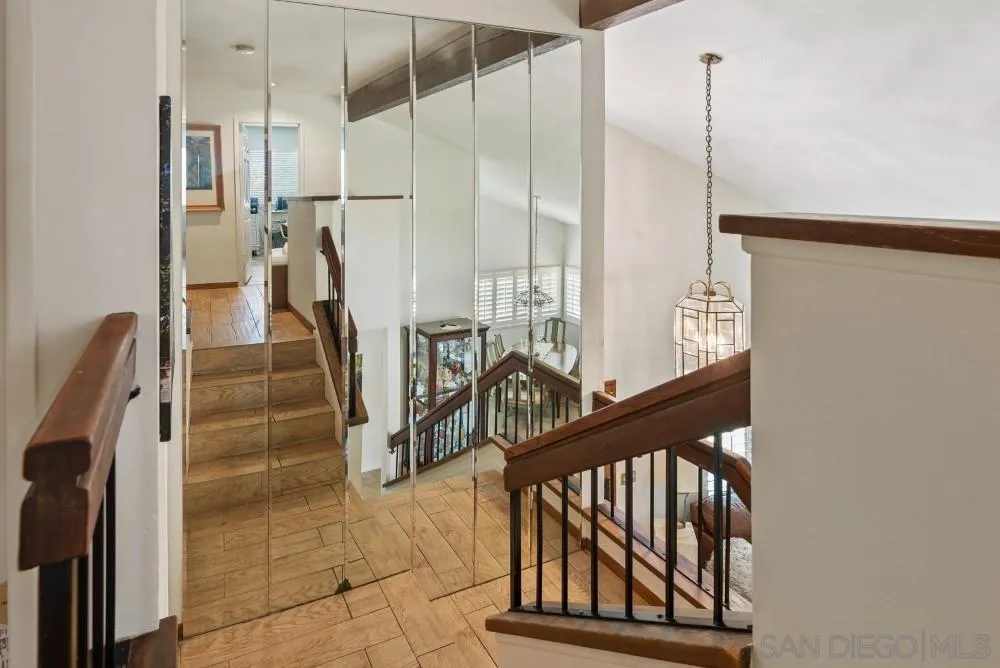 13227 Treecrest Street Poway, CA 92064 - Photo 17 of 32 a view of entryway and hall with wooden floor